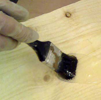 Brush Wood Hardener into the cleaned down surfaces, prior to filling with Epoxy Putty