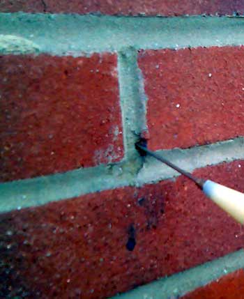Injecting brick joint with 2mm needle