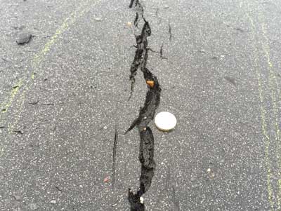 Cracks in asphalt and tarmac can be filled using Structural epoxy Pouring Grout
