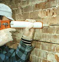 Injecting Thixotropic Resin into a wall slot for 'stitching'